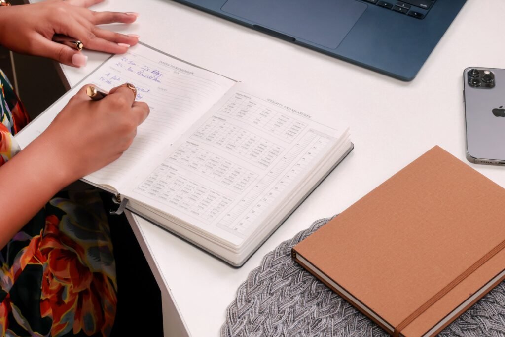 Stay Motivated by writing in notebook image